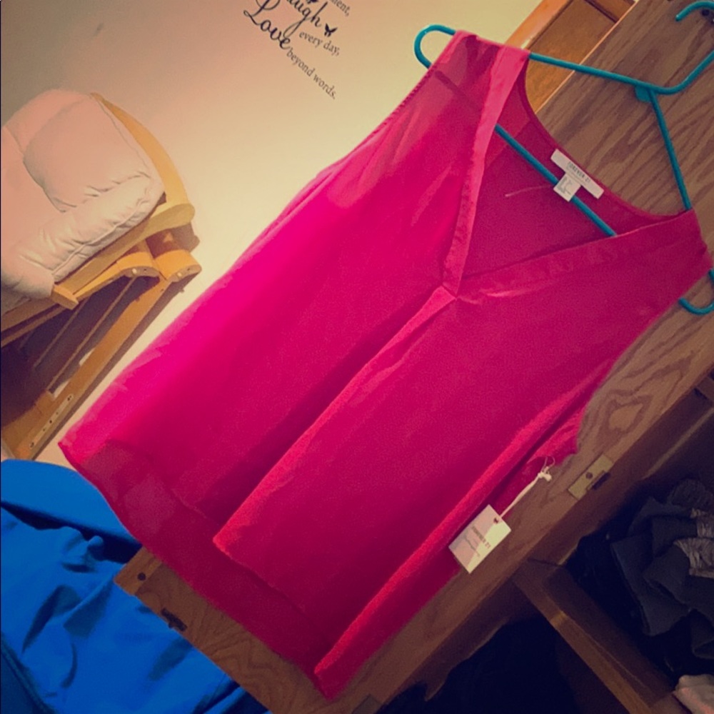 Pink sleeveless blouse
